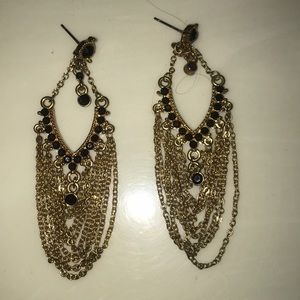 Gold earrings with black stones